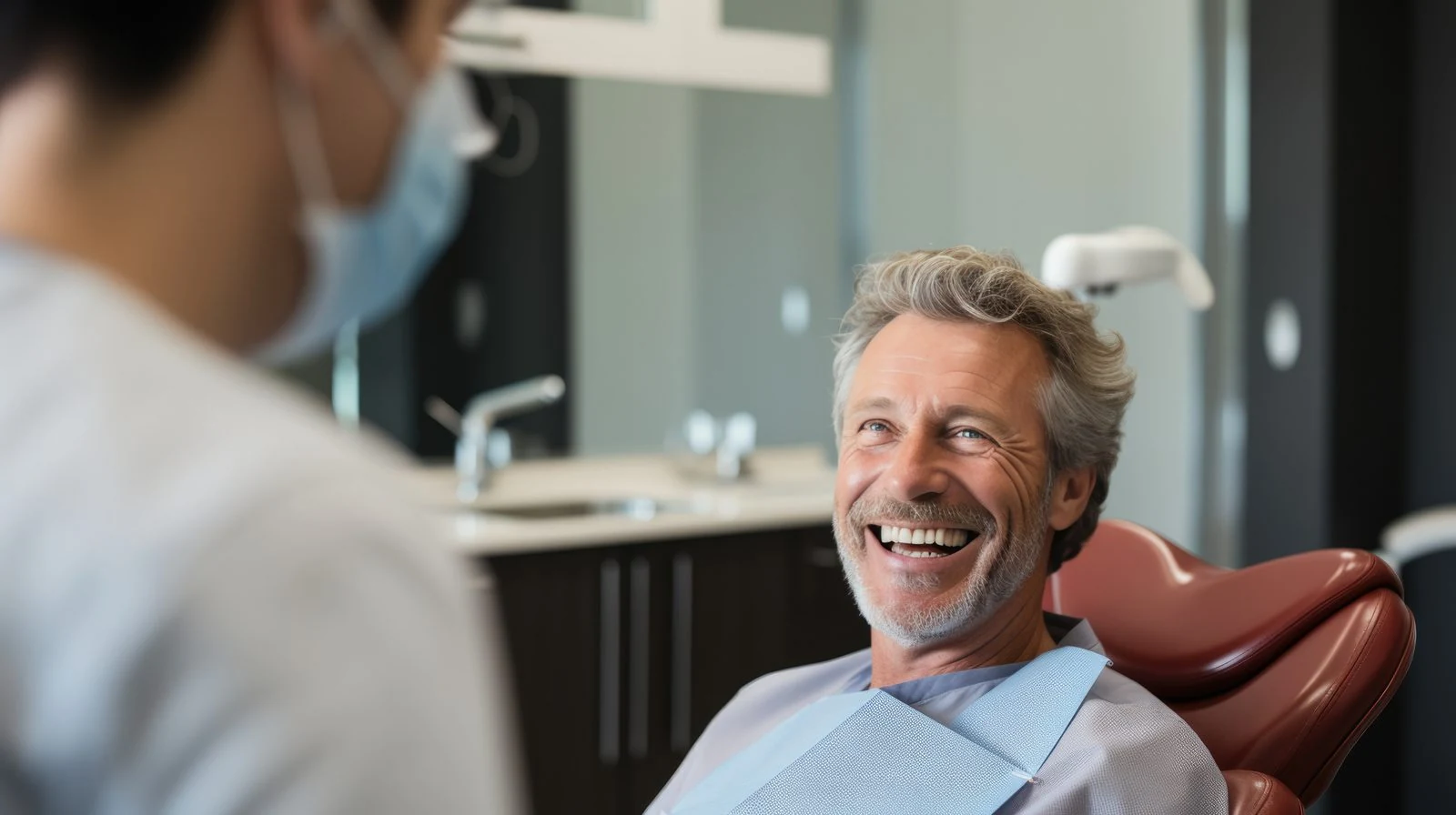 Adult patient receiving a gum health check at Sundent Family Dental Etobicoke